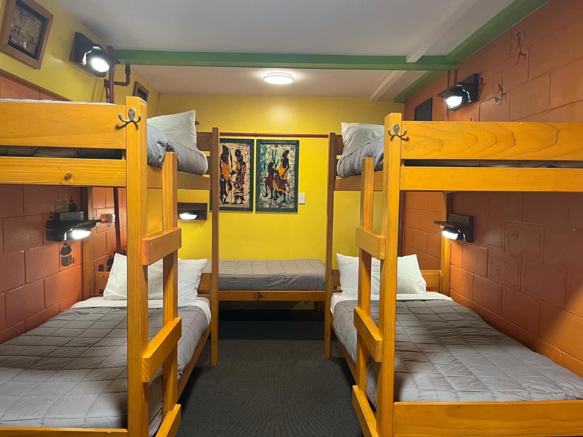 Global Village Travellers Lodge Greymouth Kültér fotó A bunk room at a hostel in New Zealand